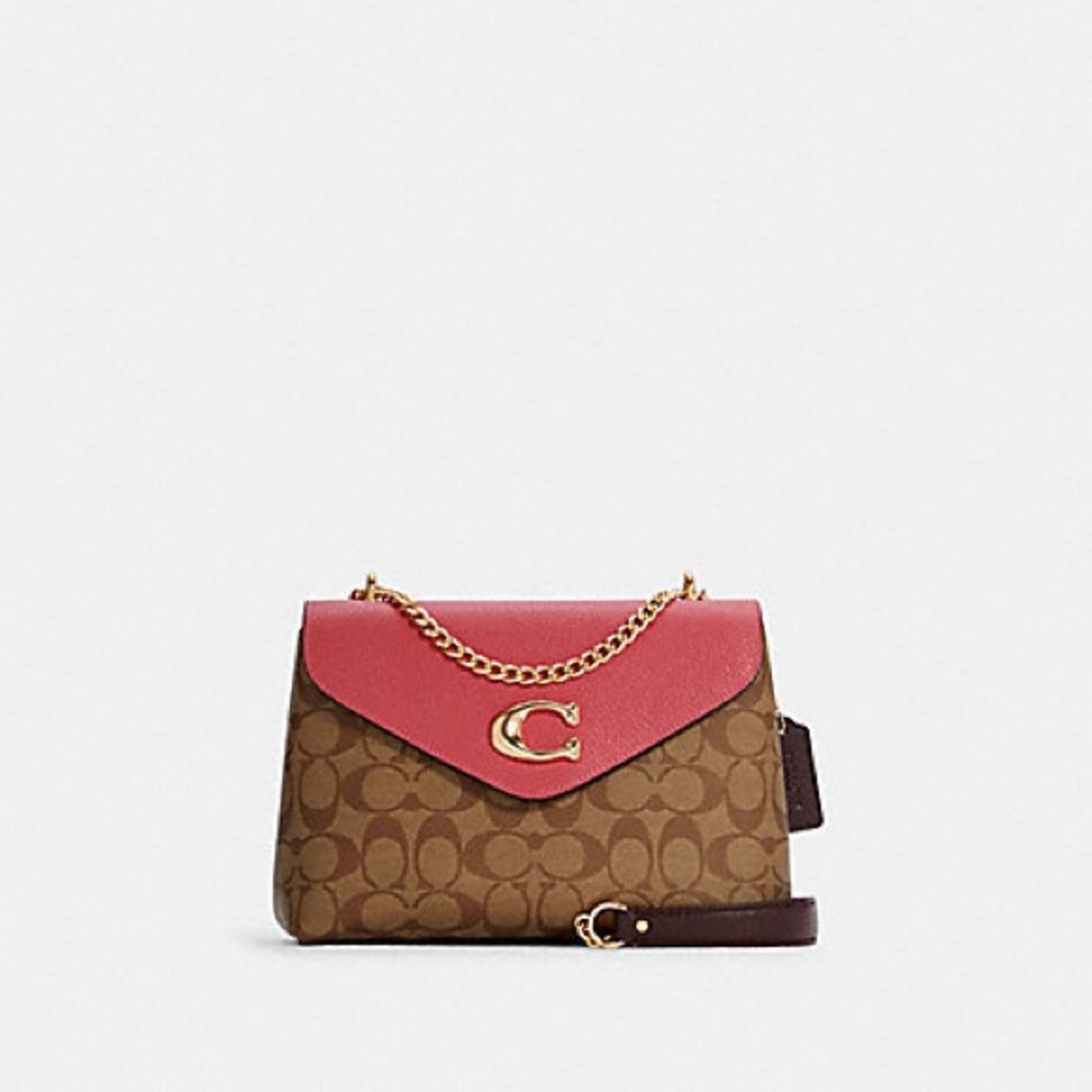 Coach Tammie Shoulder Bag in Signature coated canvas and pink leather